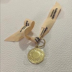 NWT Burberry Gold Key Holder with Cream Ribbon